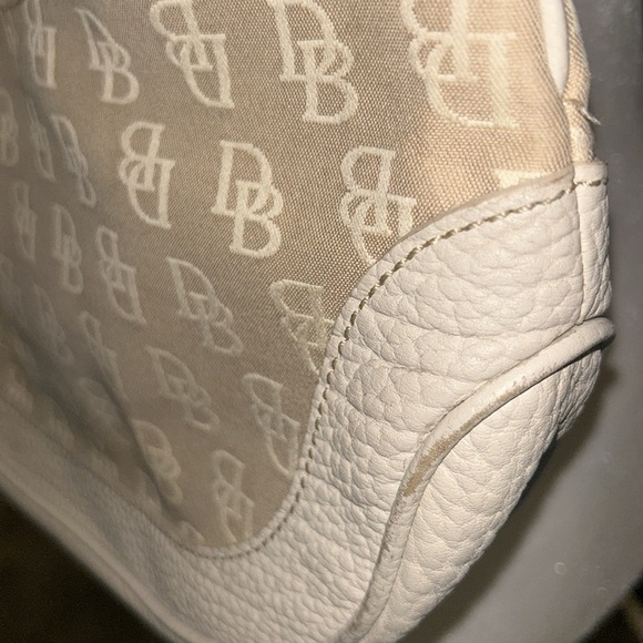 Dooney and Bourke vintage hobo purse in the color cream. - Picture 5 of 14
